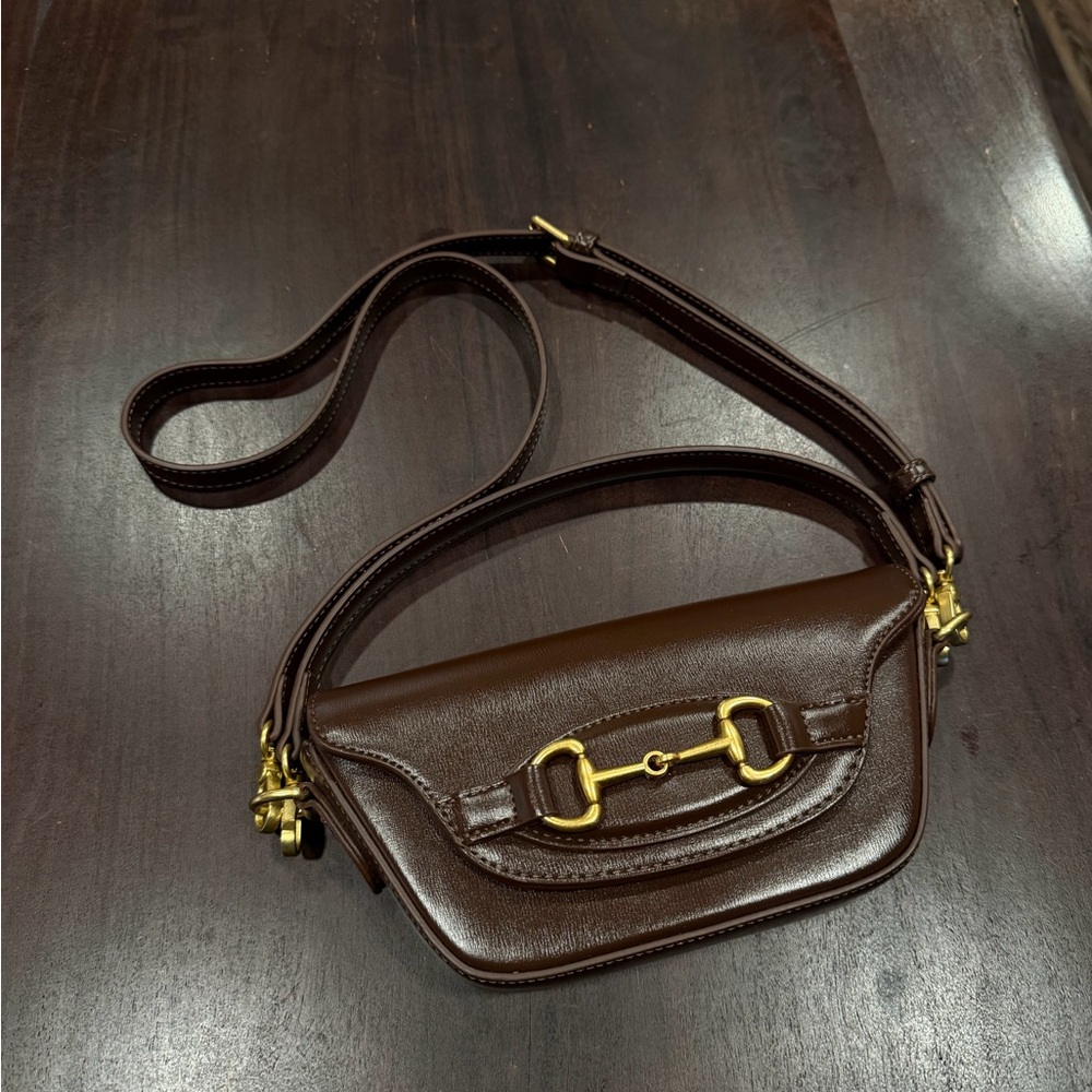 Anthropologie brown bag with buckle